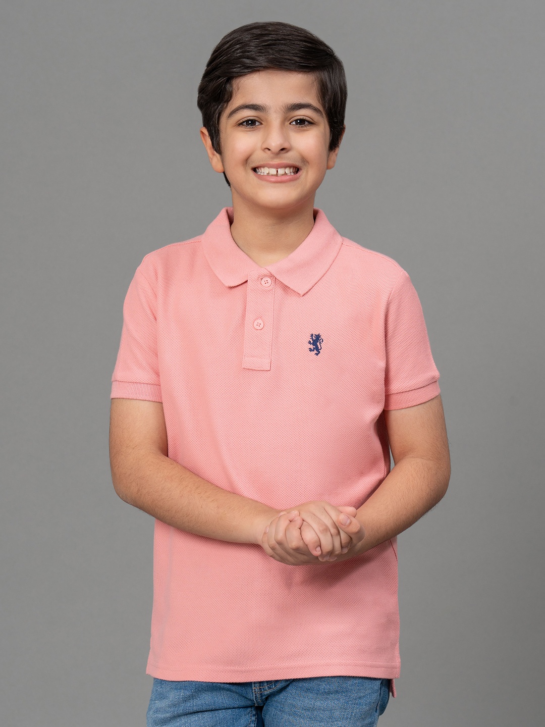 

Red Tape Boys Coral Pink Solid Polo Collar T-shirt