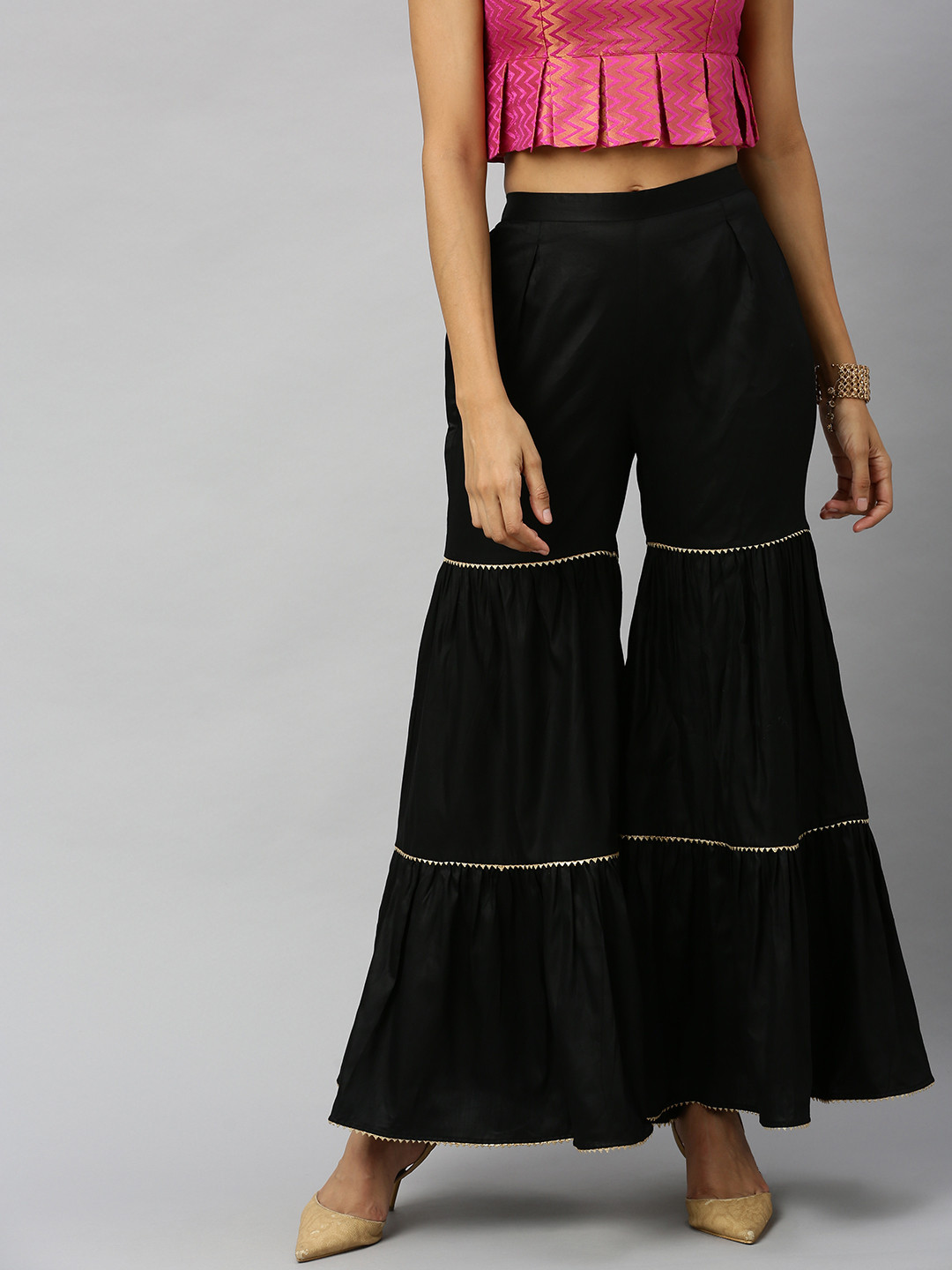 

Inddus Women Black Solid Tiered Flared Palazzos
