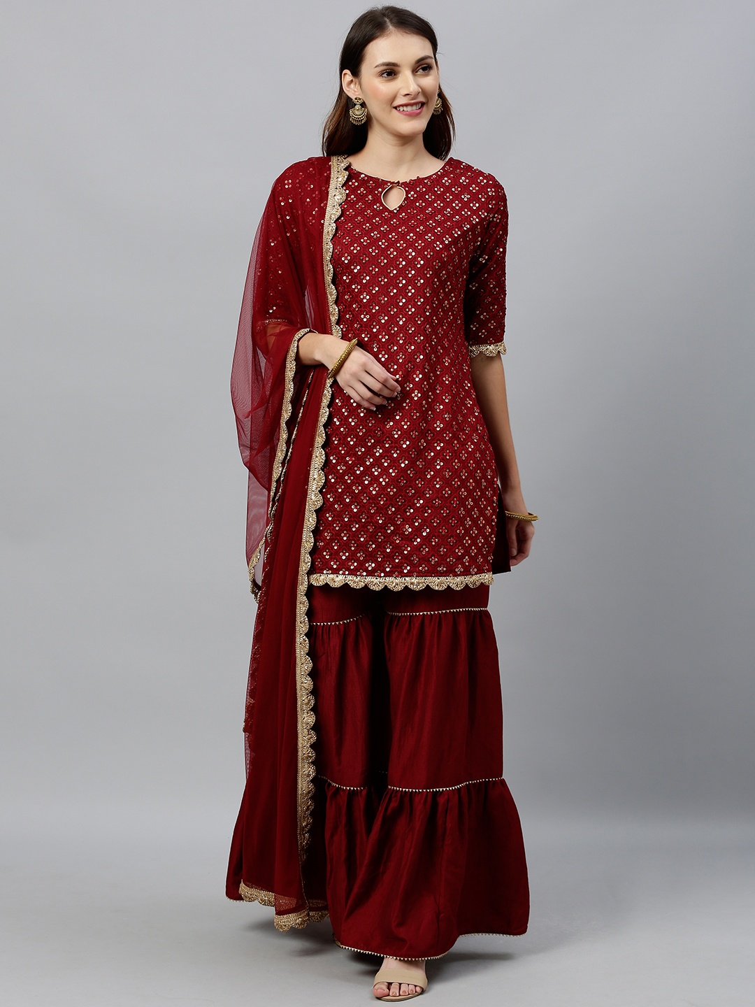 

Inddus Women Maroon & Gold-Toned Embroidered Kurta with Sharara & Dupatta