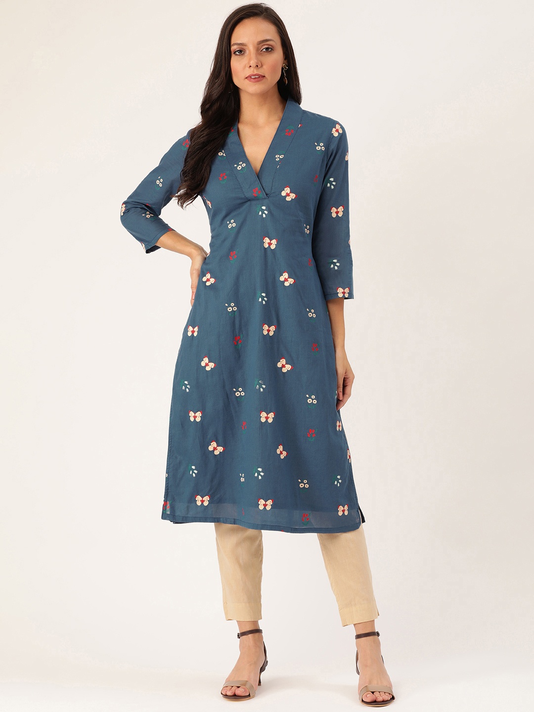 

Moda Rapido Women Teal Blue & Beige Quirky Print Straight Kurta