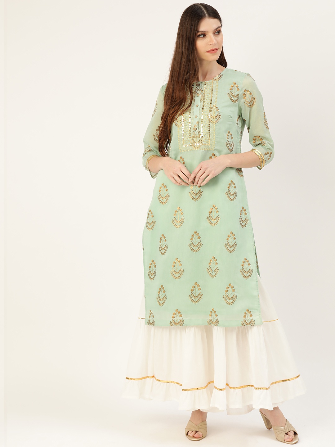 

Moda Rapido Women Sea Green & Off-White Printed Kurta with Sharara