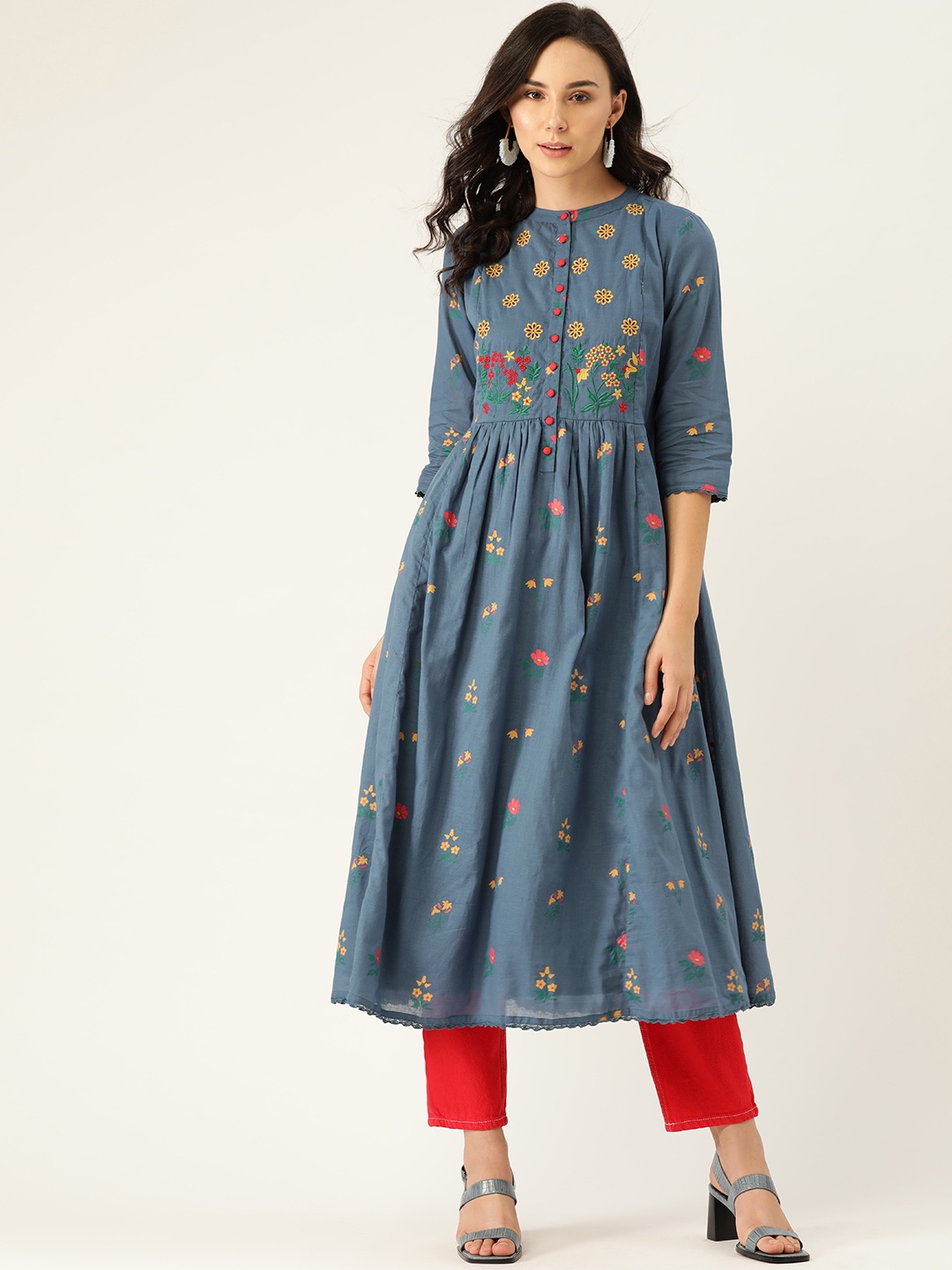 

Moda Rapido Women Navy Blue & Mustard Yellow Floral Printed A-Line Kurta