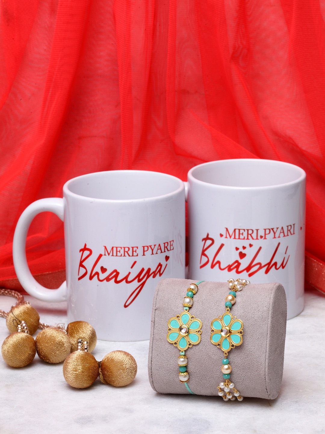 

PANASH Men Gold-Toned Floral Rakhi & Lumba Bracelet With Bhaiya & Bhabhi Mugs