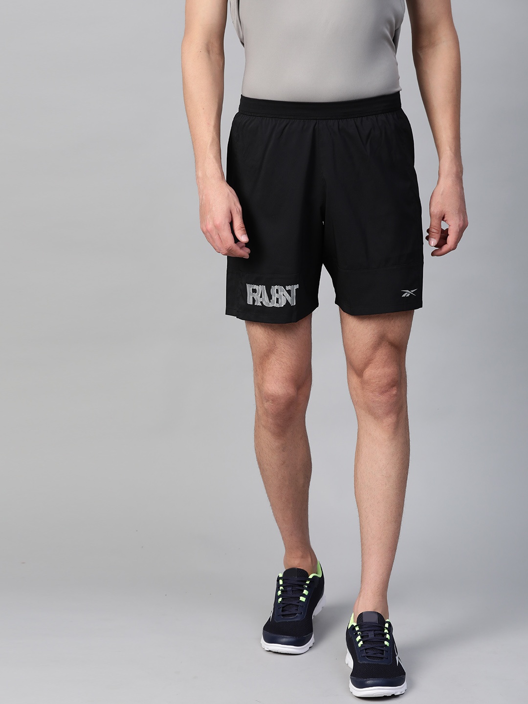 

Reebok Men Black Solid Run Essentials 7-Inch WG Shorts