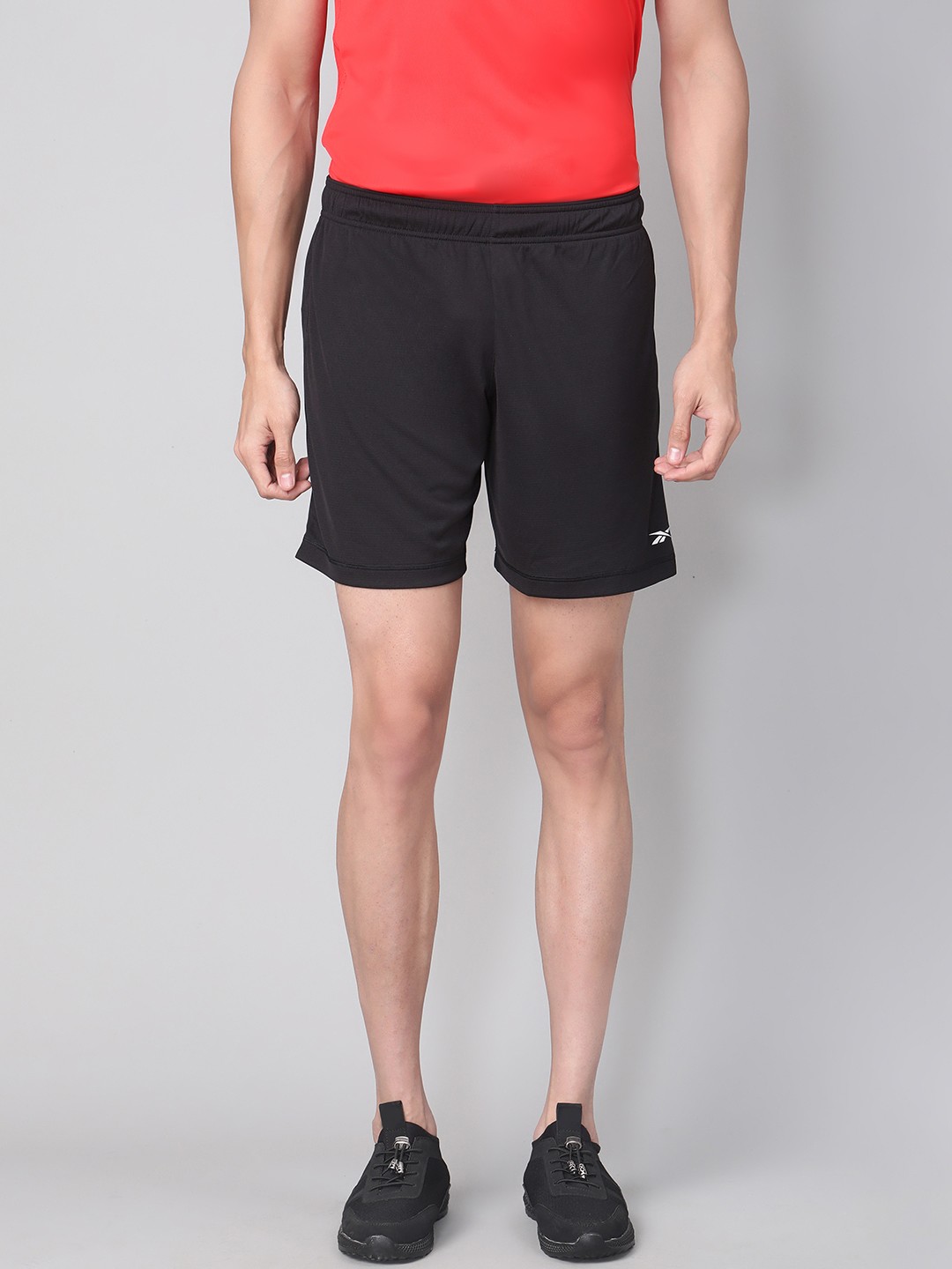 

Reebok Men Black Solid Running Essentials Basic 7-Inch Shorts