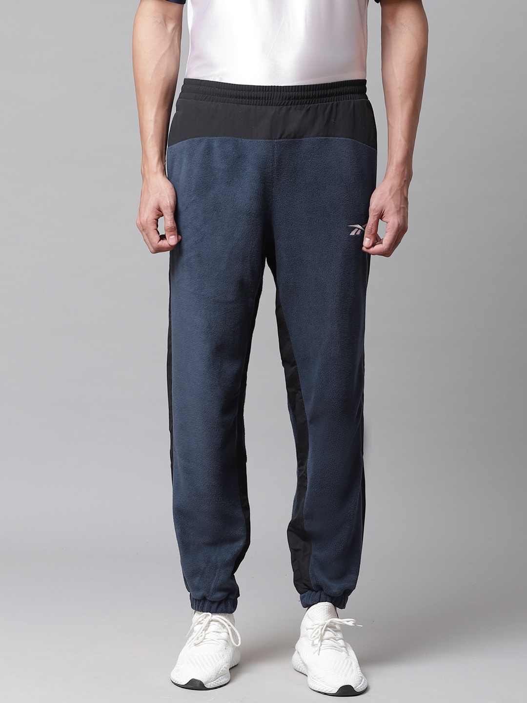 

Reebok Men Navy Blue Solid Fleece Workout Ready Training Joggers