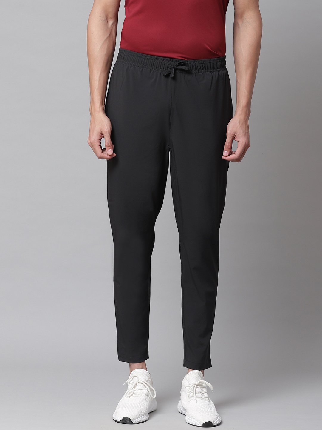 

Reebok Men Black Solid OSR Running Track Pants