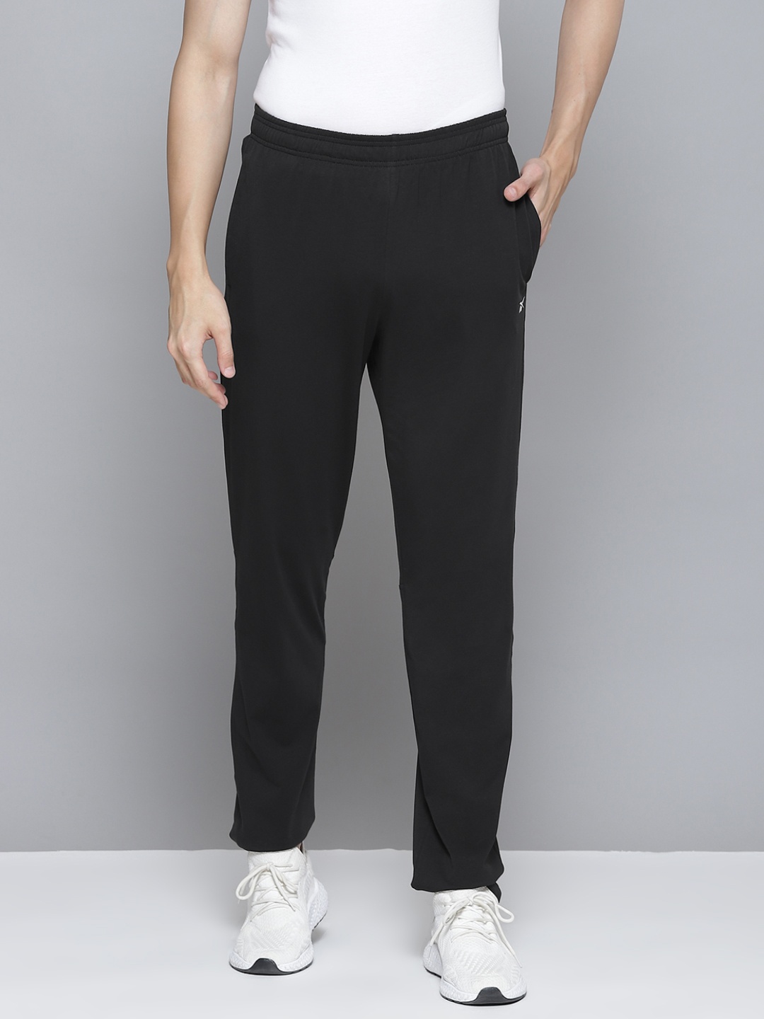 

Reebok Men Black Solid Training Essentials Track Pants