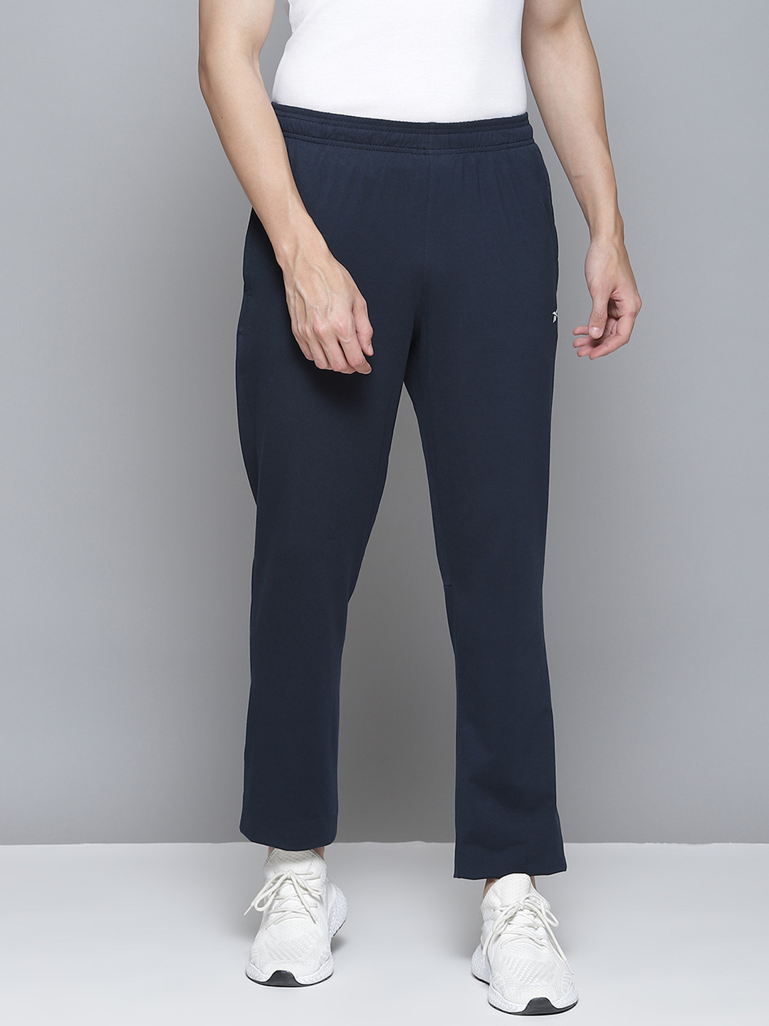 

Reebok Men Navy Blue Solid Training Essentials Track Pants