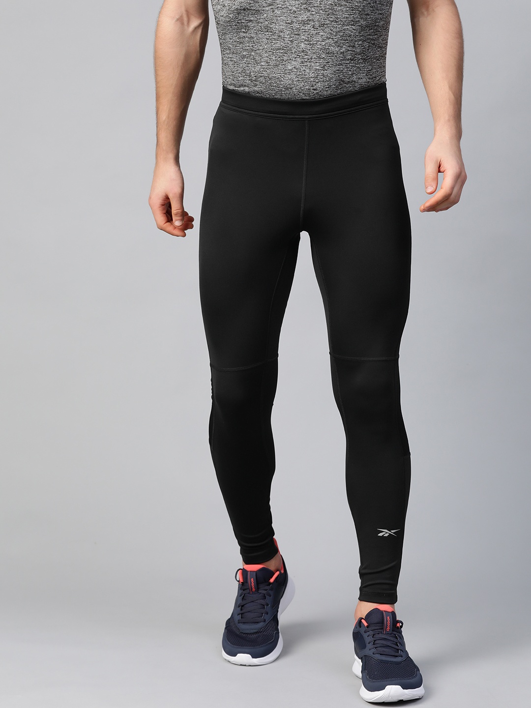 

Reebok Men Black Solid Running Essentials Speedwick Tights