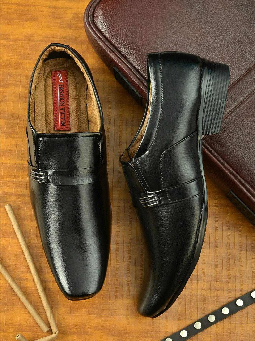 

Fashion Victim Men Black Solid Formal Slip-Ons