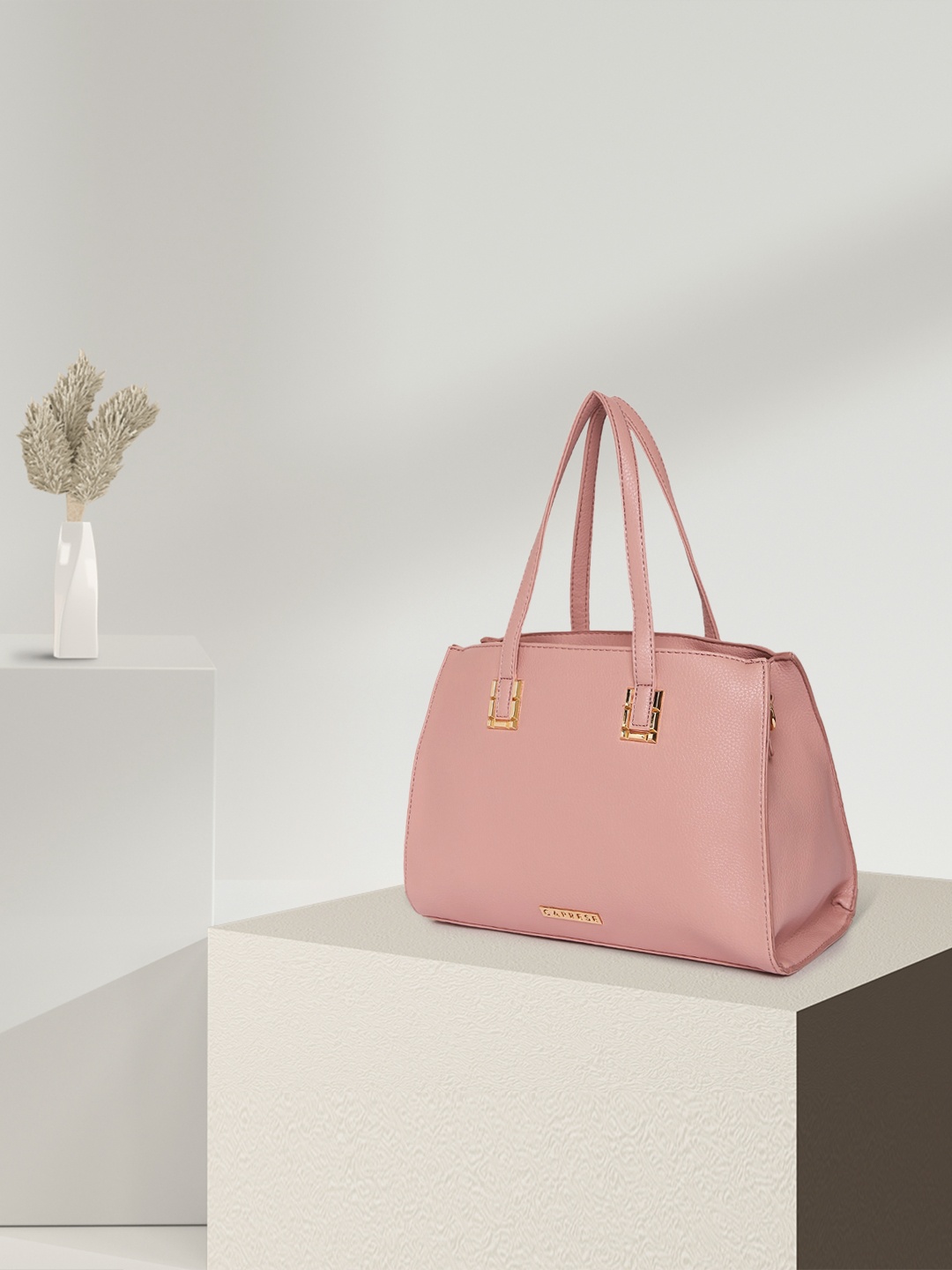 

Caprese Peach-Coloured Solid Thyma Handheld Bag