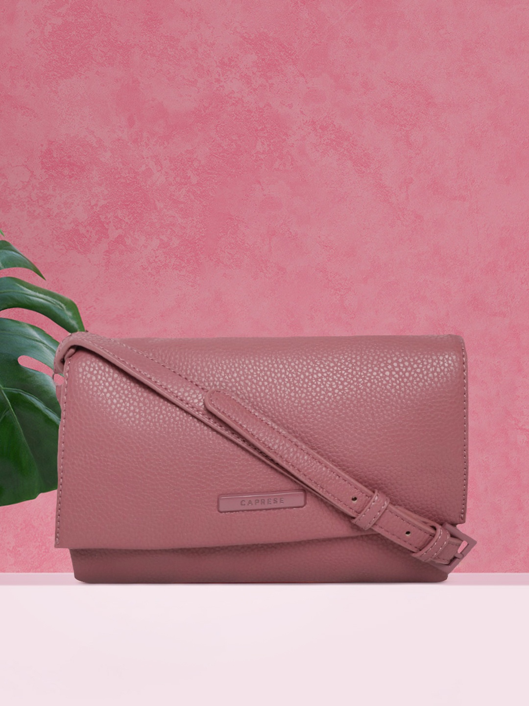 

Caprese Mauve Solid Sling Bag
