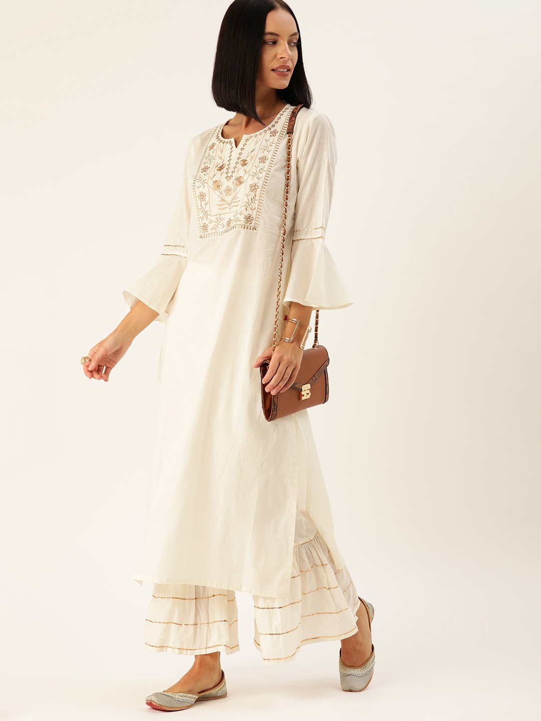 

Varanga Women Off-White Embroidered Kurta with Palazzos