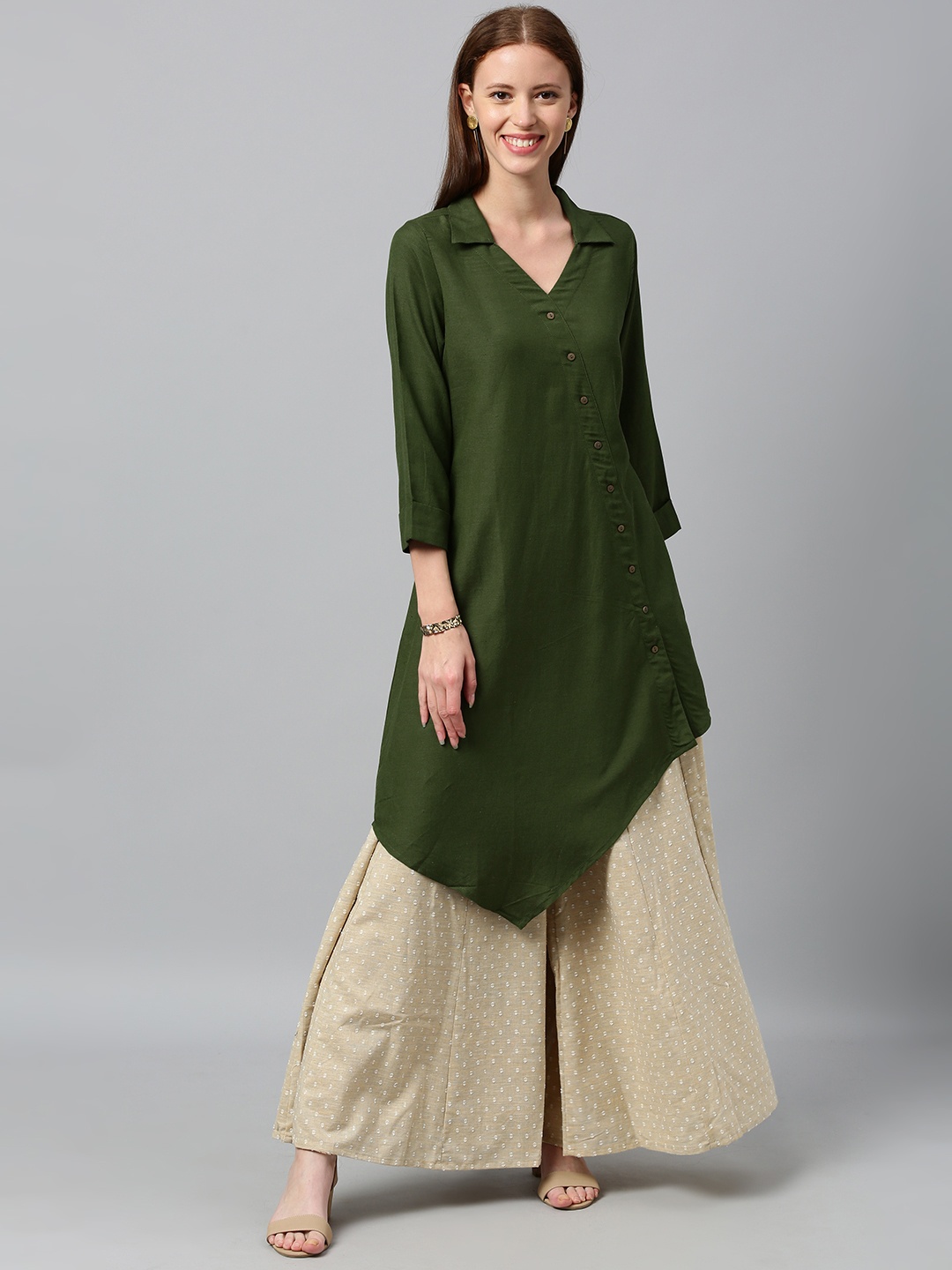 

Global Desi Women Olive Green Solid Asymmetric Hem Tunic
