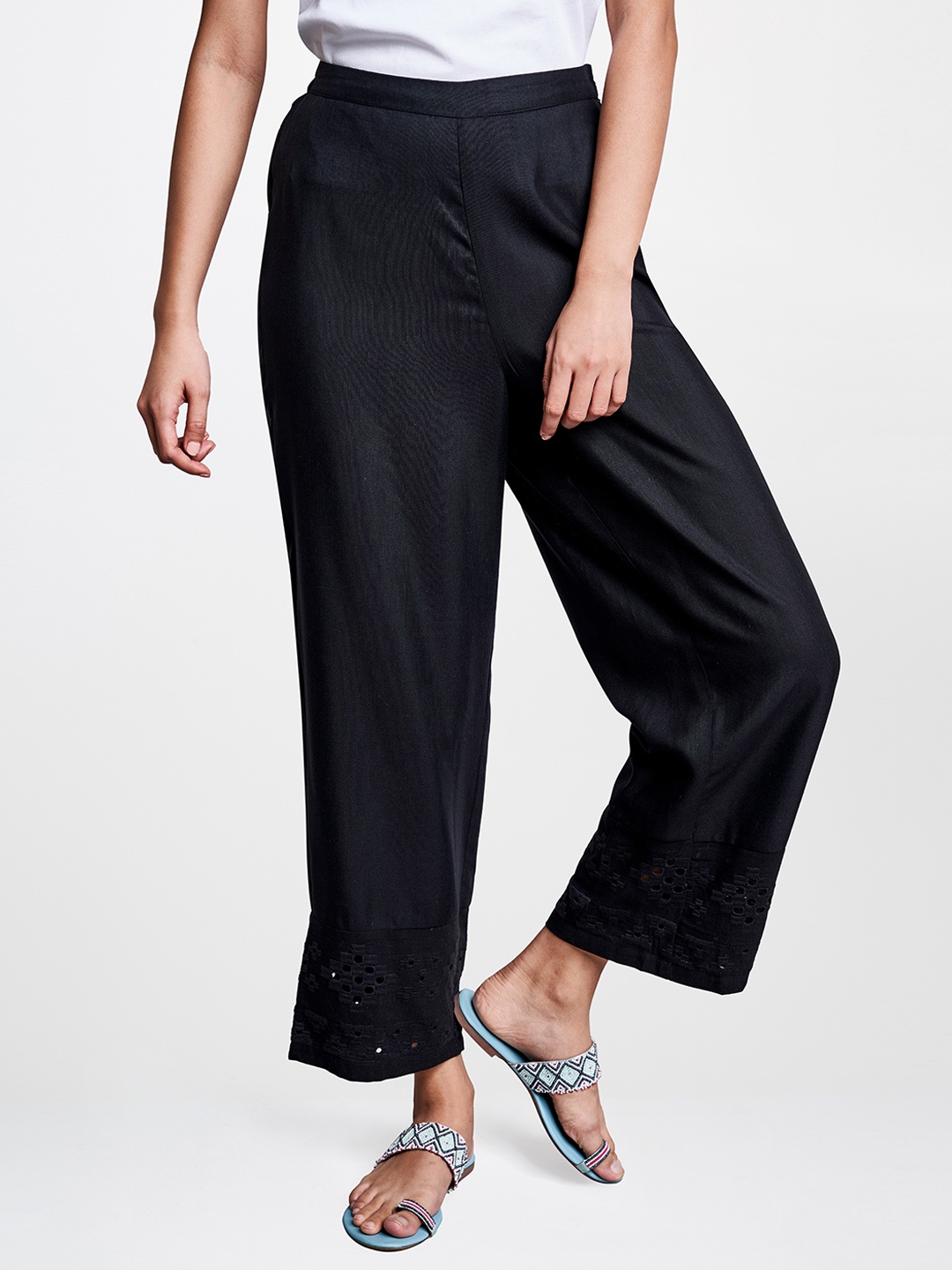 

Global Desi Women Black Regular Fit Solid Parallel Trousers