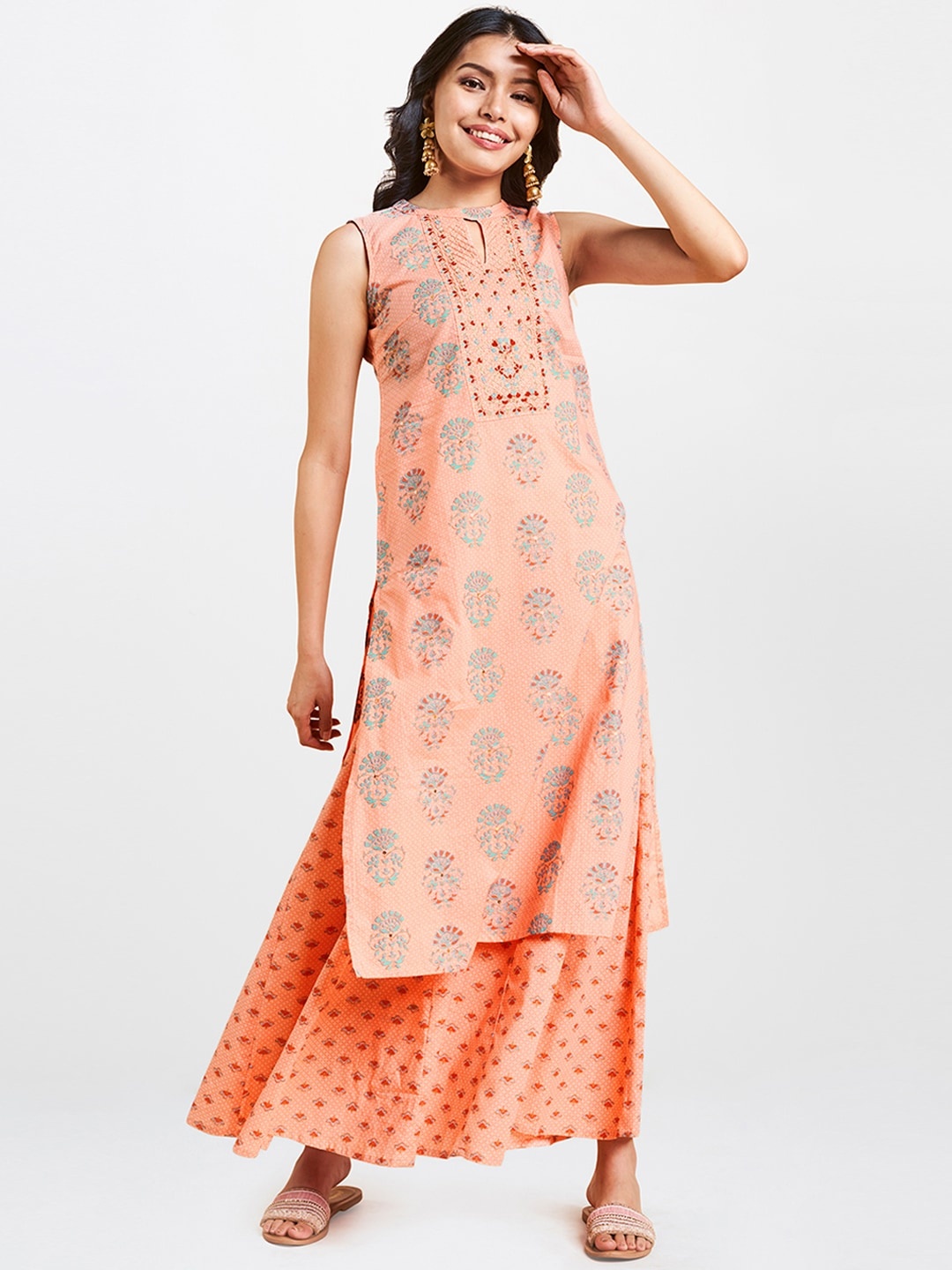 

Global Desi Women Peach-Coloured Printed Kurta with Palazzos