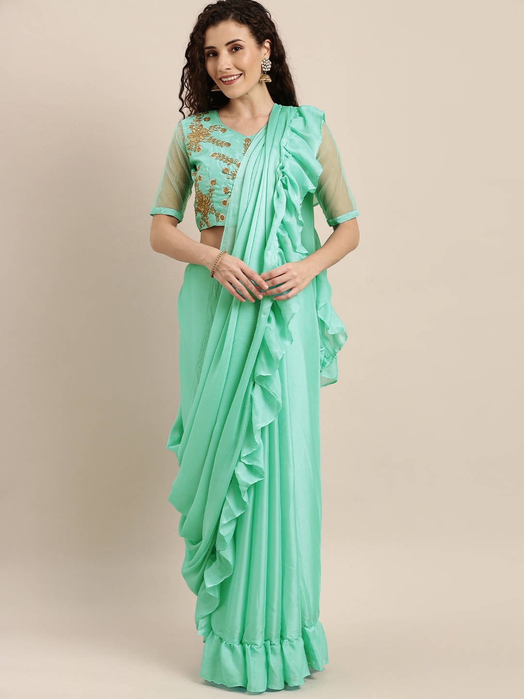 

SHAVYA Green Solid Silk Blend Saree with Ruffles