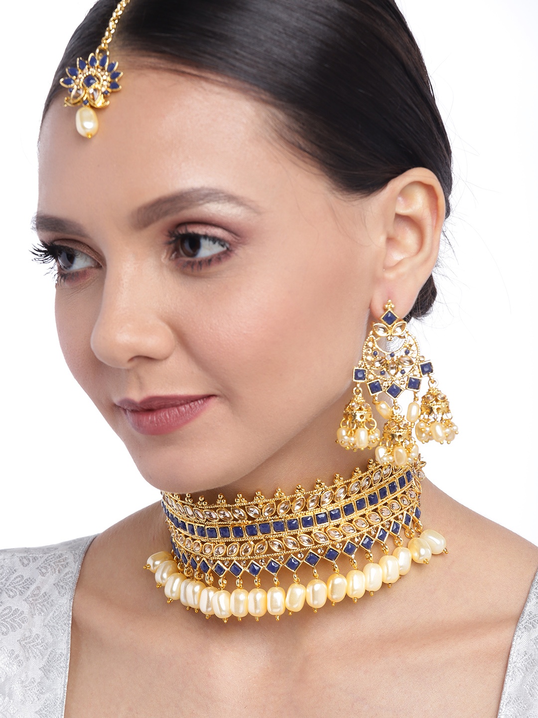 

Zaveri Pearls Navy Blue & Cream Coloured Gold-Plated Stone-Studded & Beaded Jewellery Set