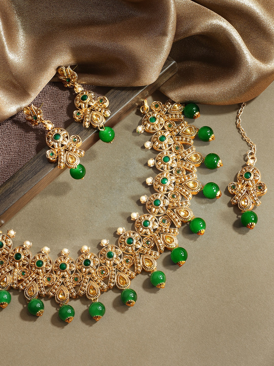

Rubans Gold-Plated & Green Faux Emerald Studded Handcrafted Traditional Jewellery Set