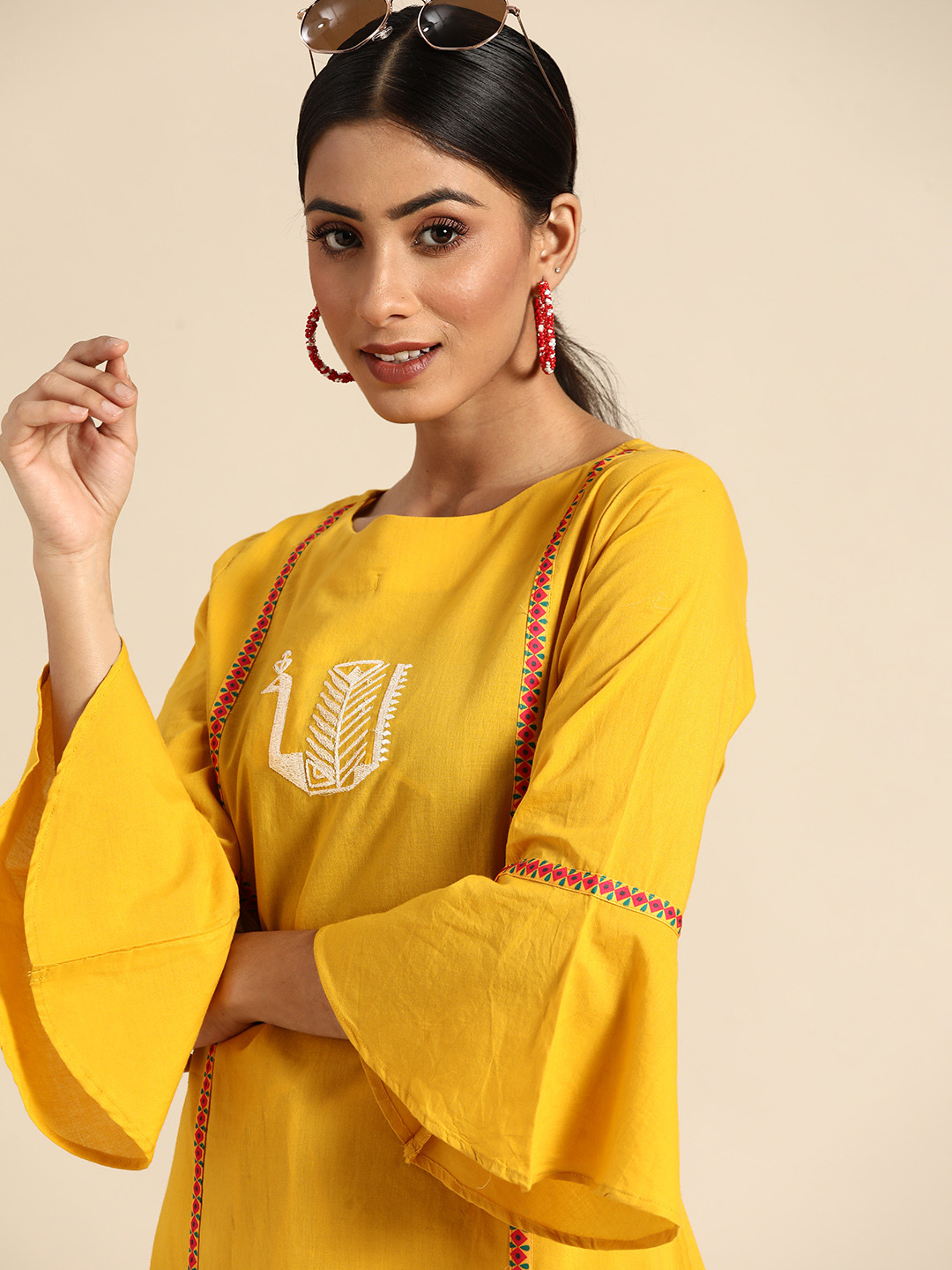 

Sangria Women Mustard Yellow Yoke Design Thread Work Pure Cotton Kurta with Palazzos