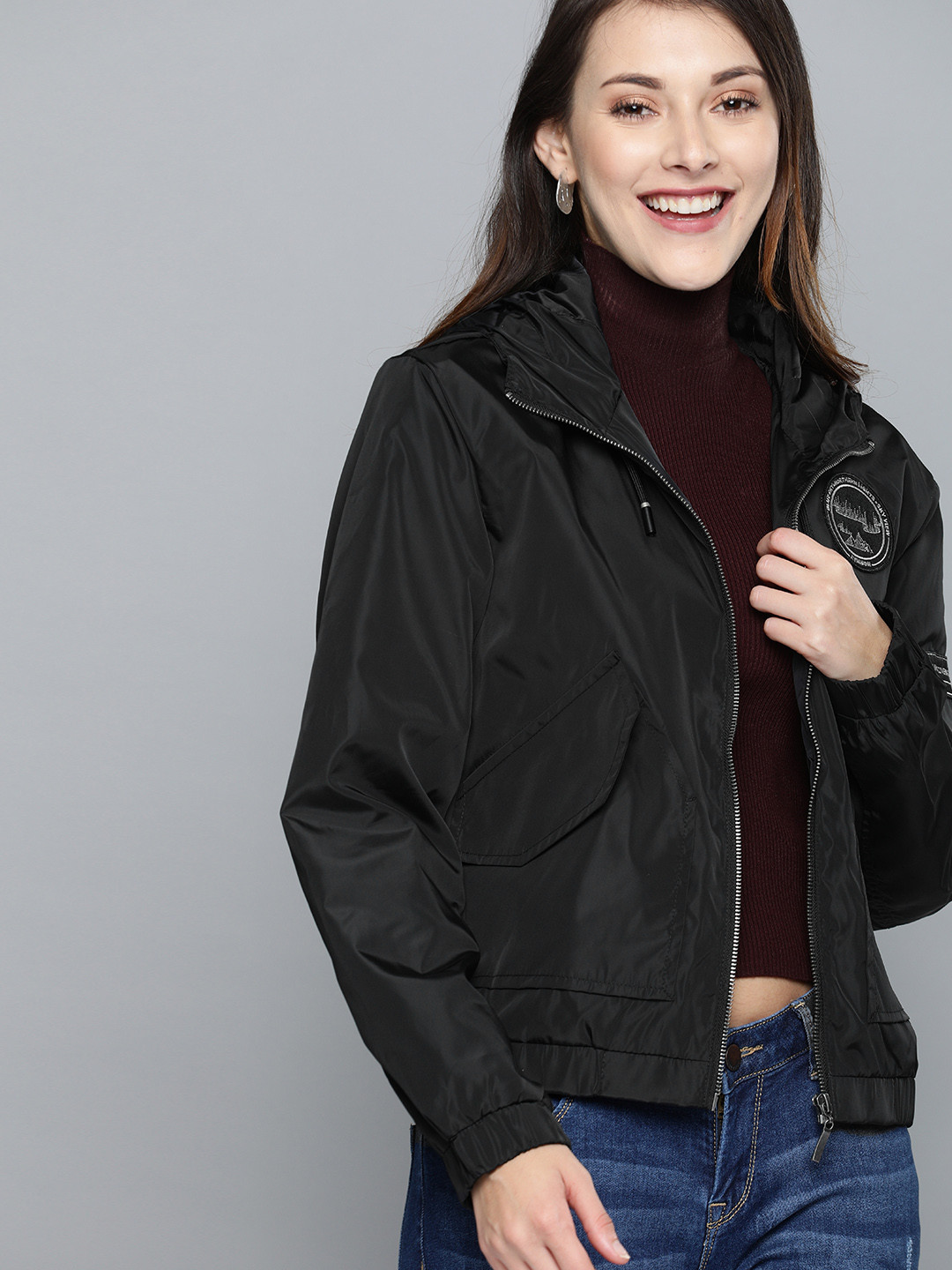 

Mast & Harbour Women Black Solid Hooded Bomber Jacket with Applique Detailing