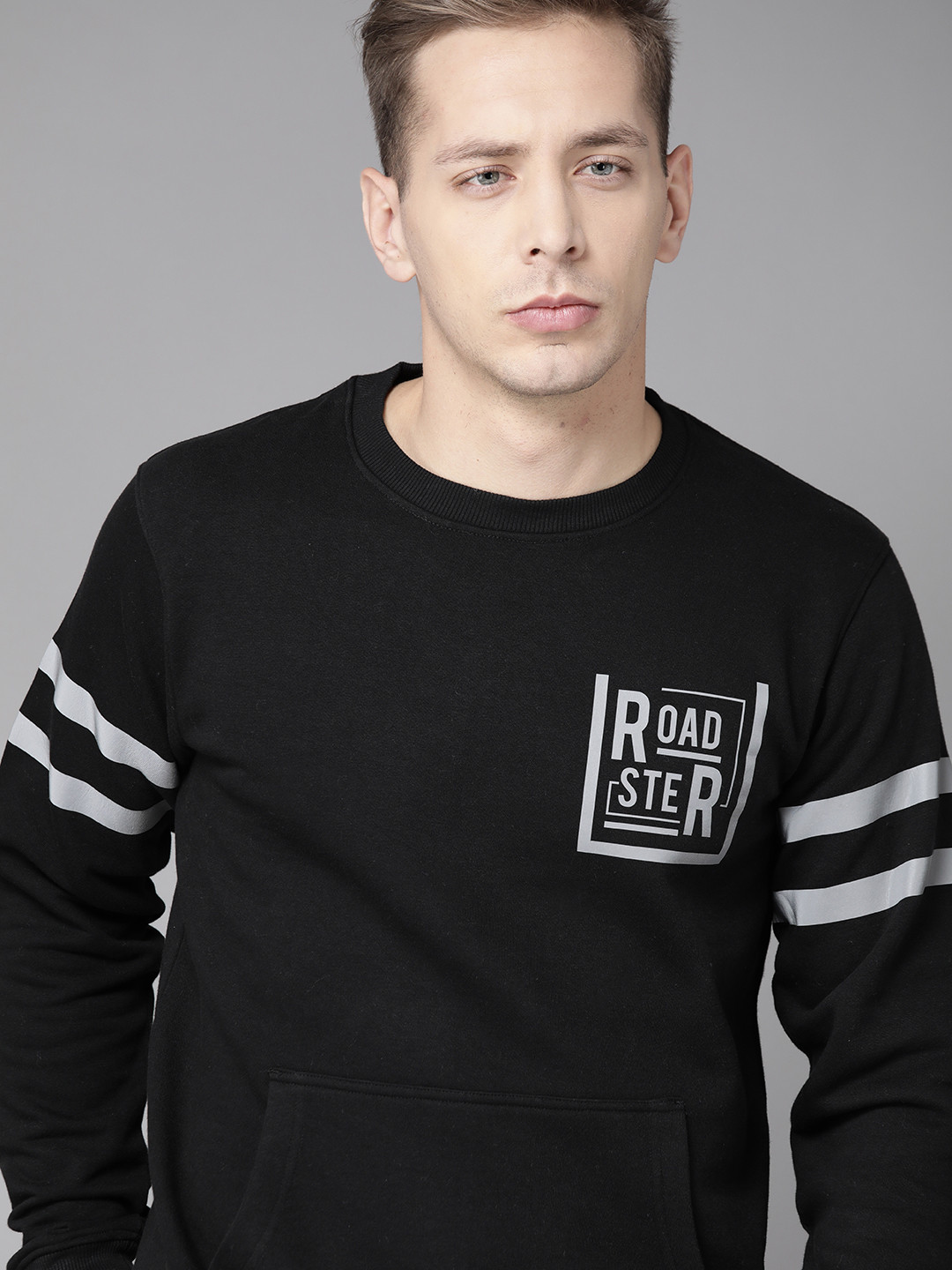 

Roadster Men Black Solid Sweatshirt