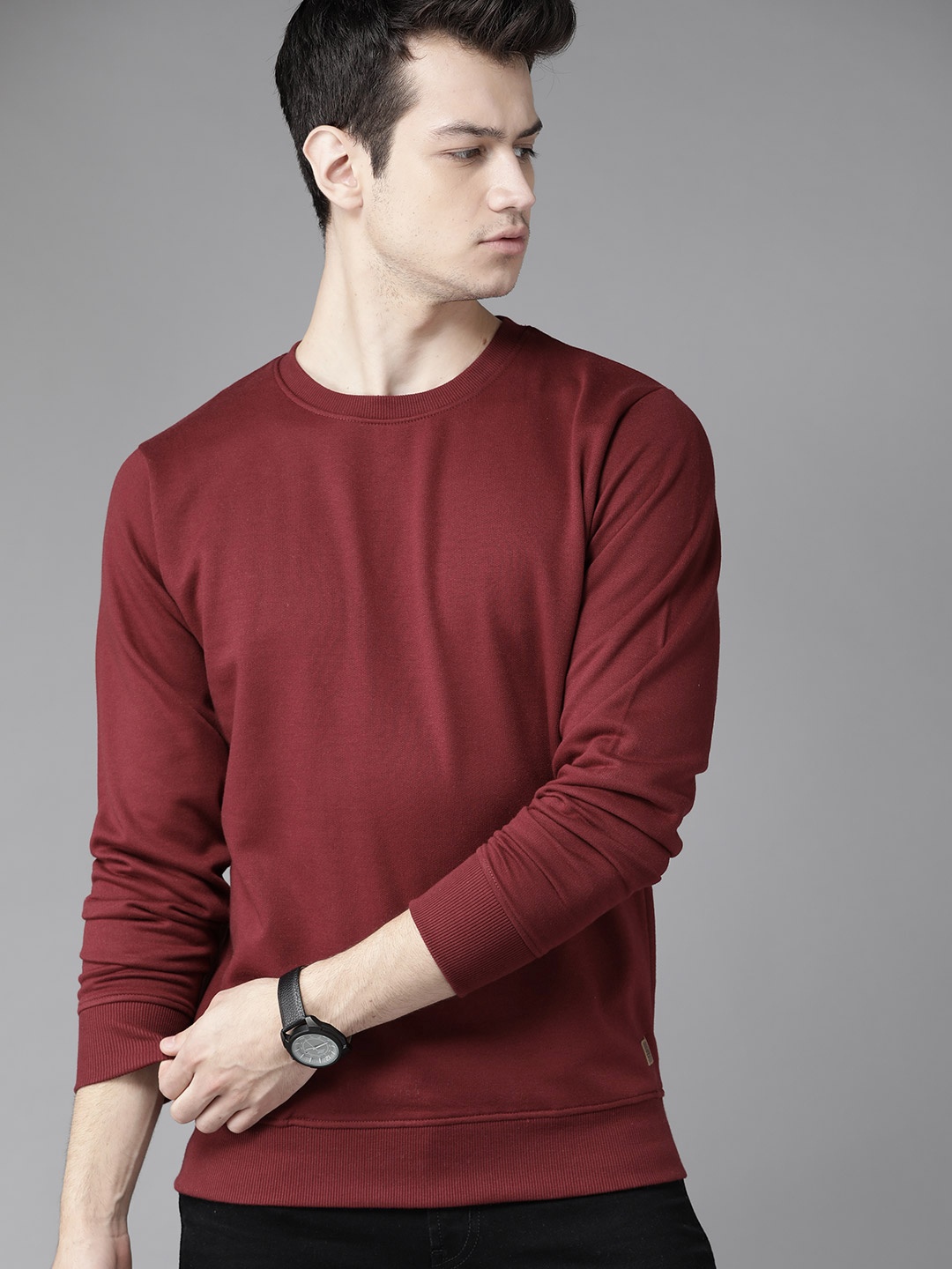 

Roadster Men Maroon Solid Sweatshirt