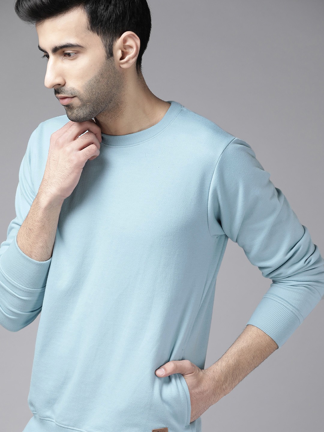 

Roadster Men Blue Solid Sweatshirt