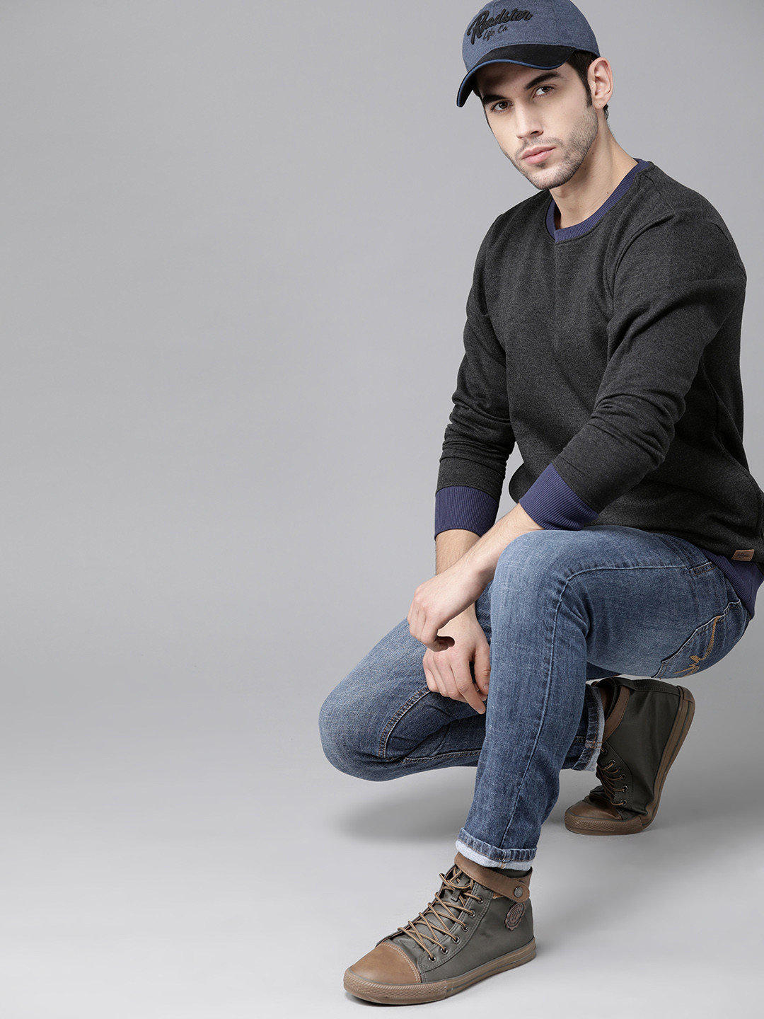 

Roadster Men Charcoal Grey Solid Sweatshirt