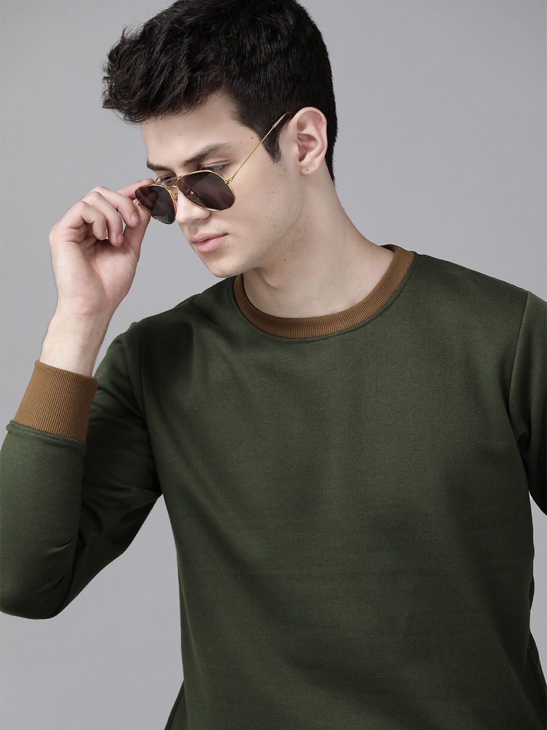 

Roadster Men Olive Green Solid Sweatshirt