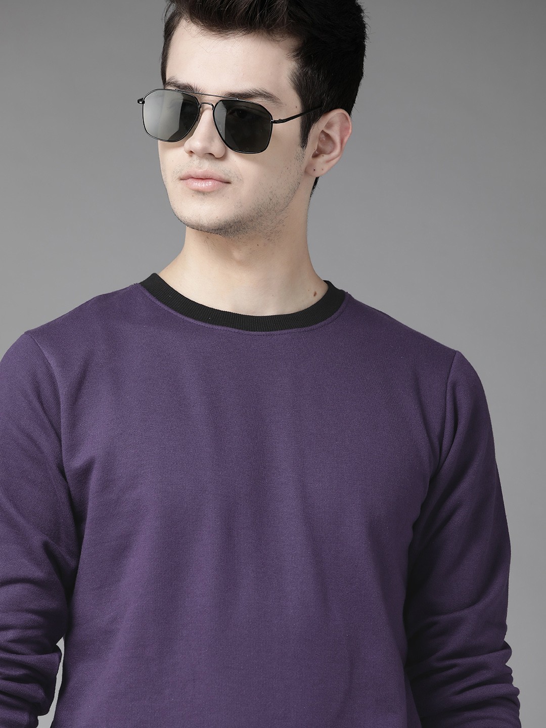 

Roadster Men Purple Solid Sweatshirt
