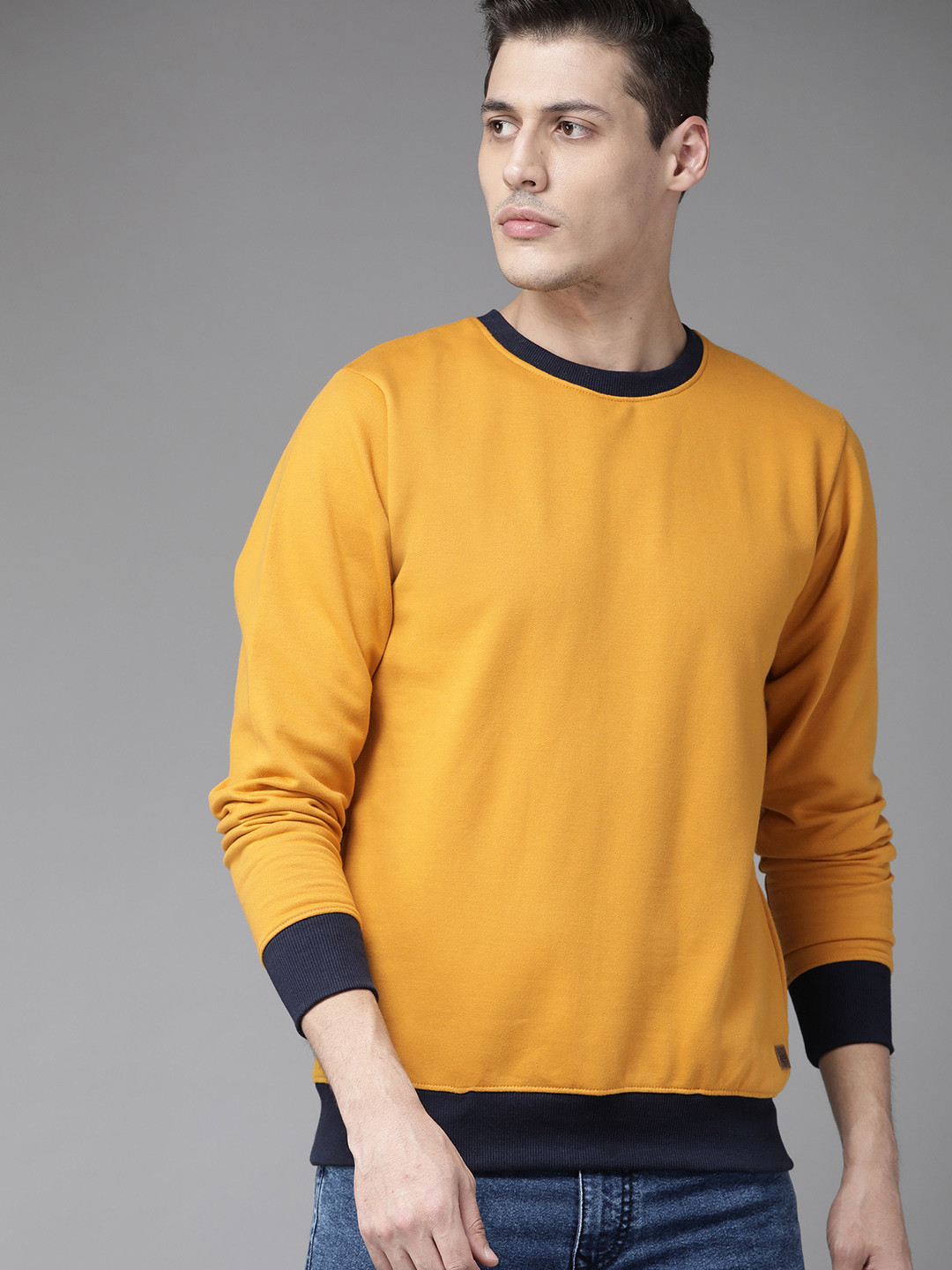 

Roadster Men Muastrd Yellow Solid Sweatshirt, Mustard
