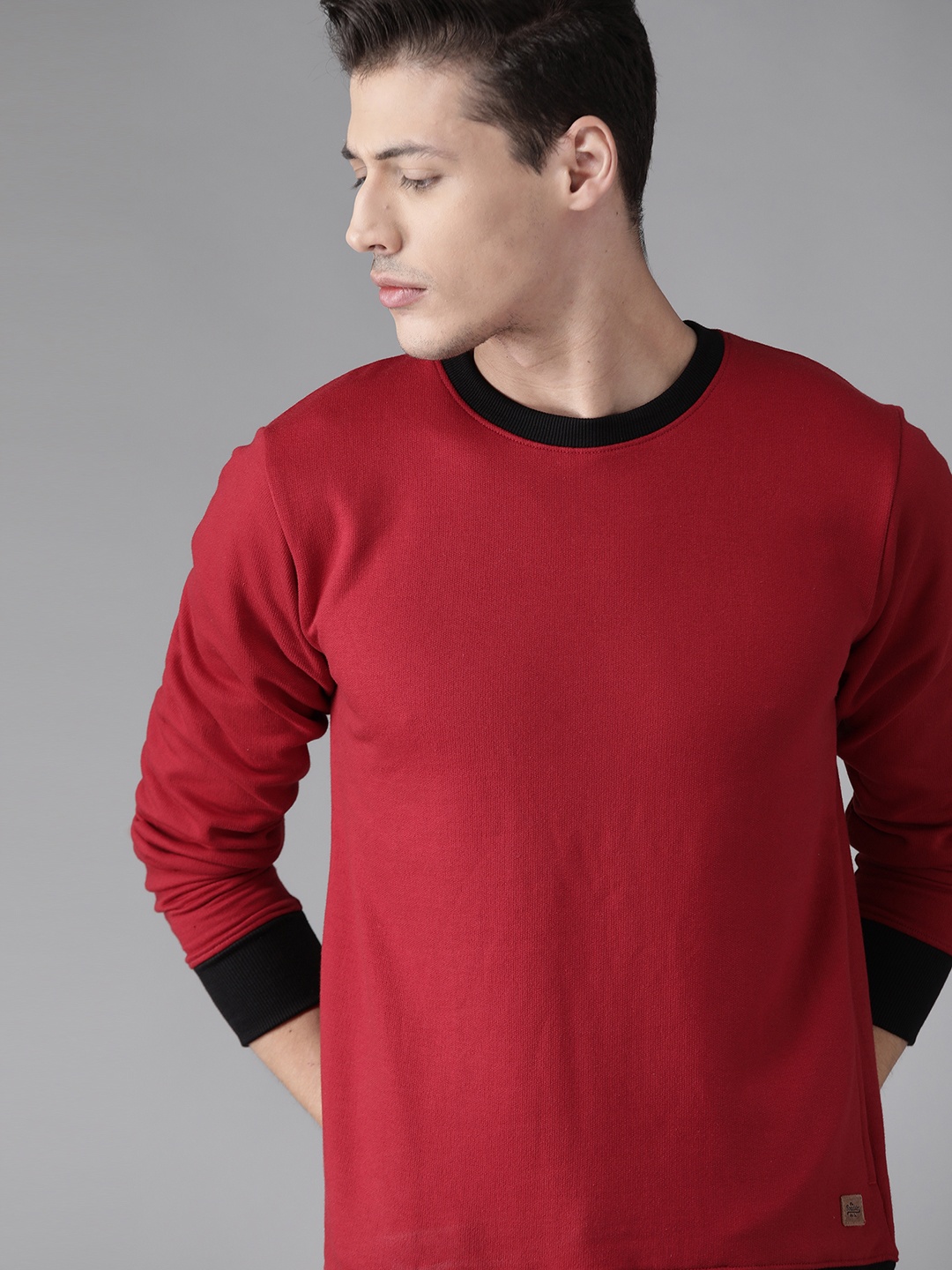 

Roadster Men Red Solid Sweatshirt