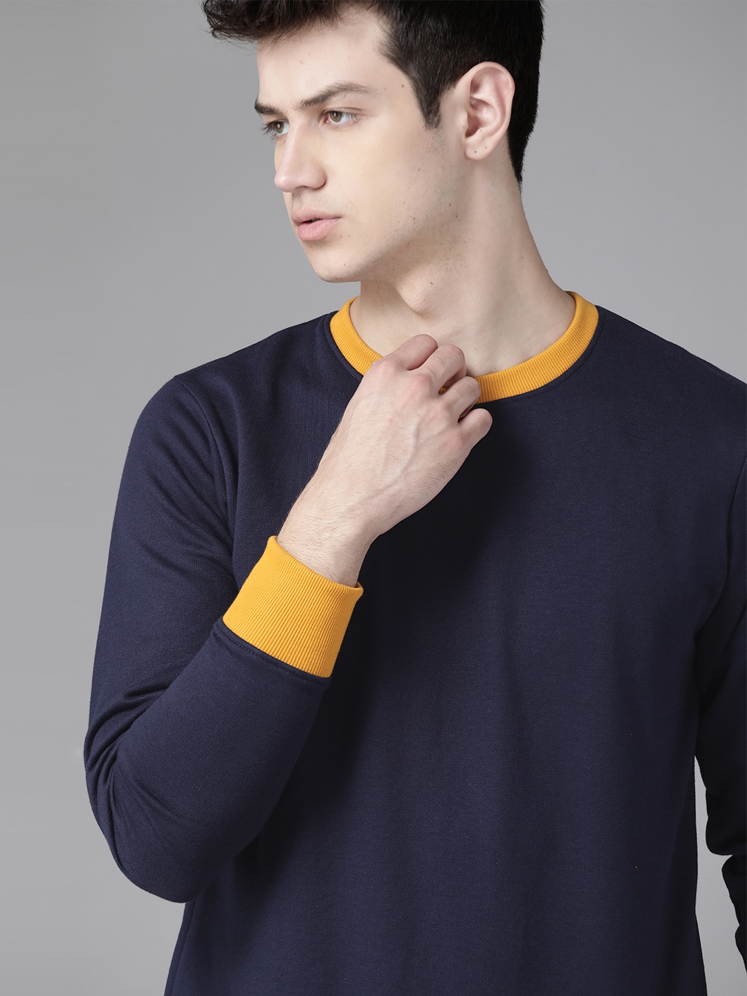 

Roadster Men Navy Blue Solid Sweatshirt