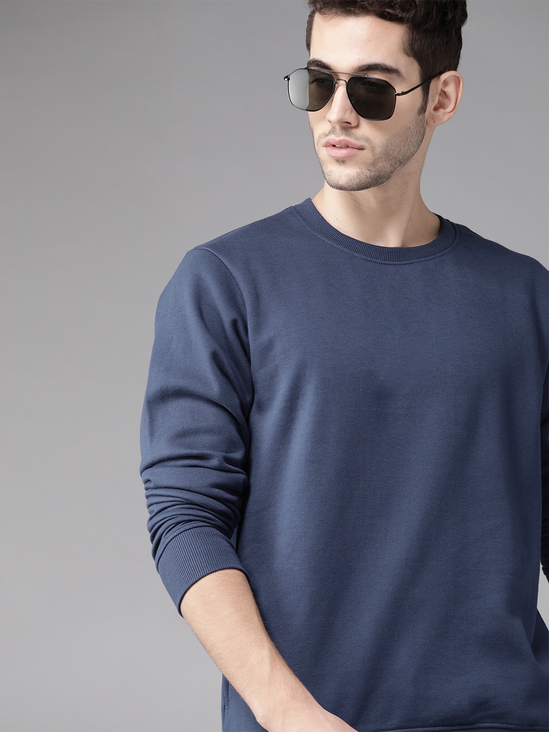 

Roadster Men Navy Blue Solid Sweatshirt