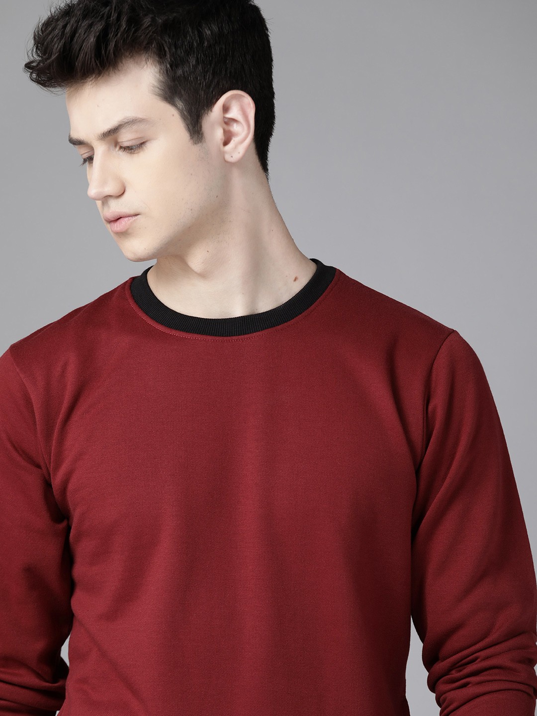 

Roadster Men Maroon Solid Sweatshirt
