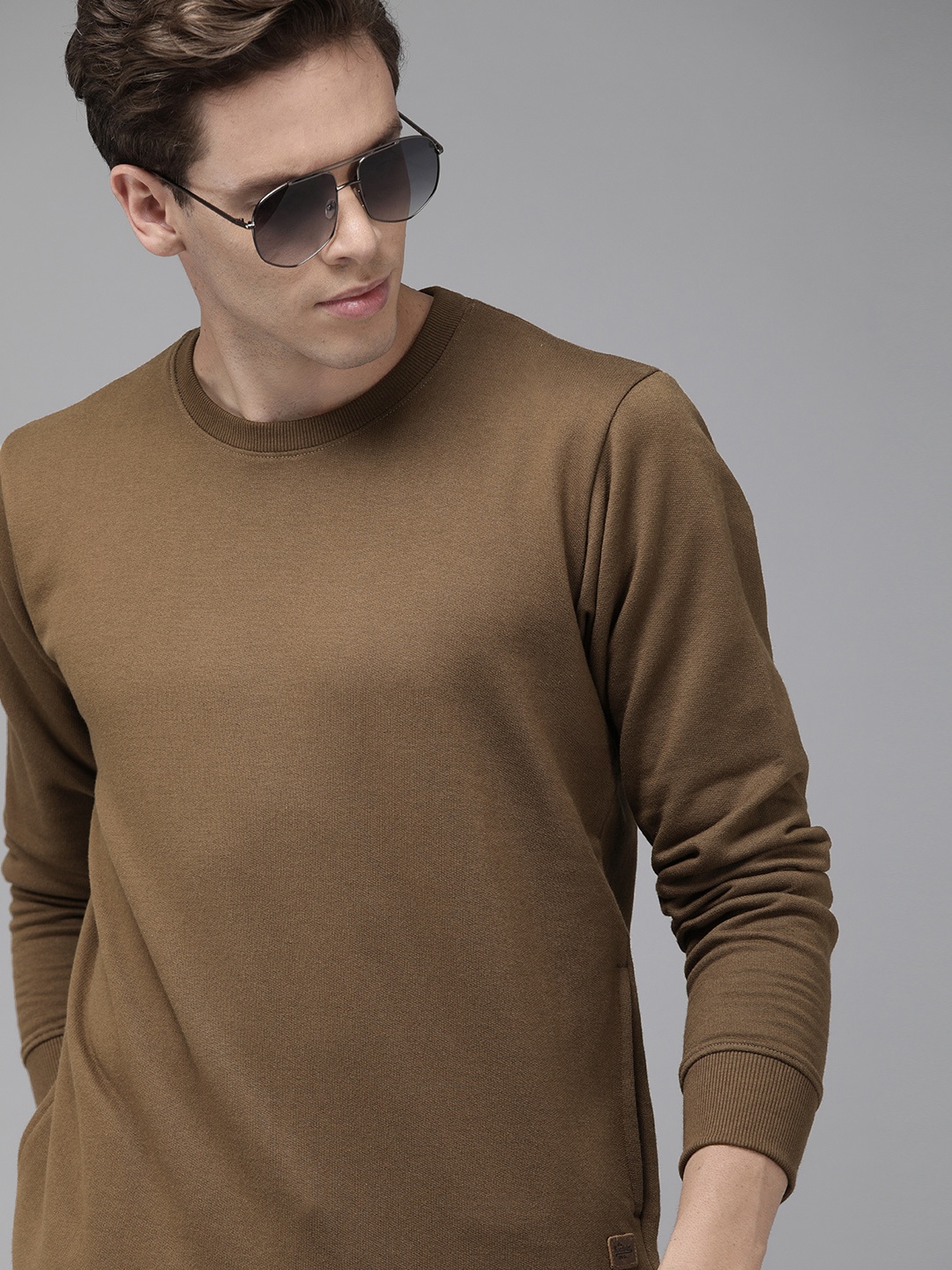 

Roadster Men Brown Solid Sweatshirt