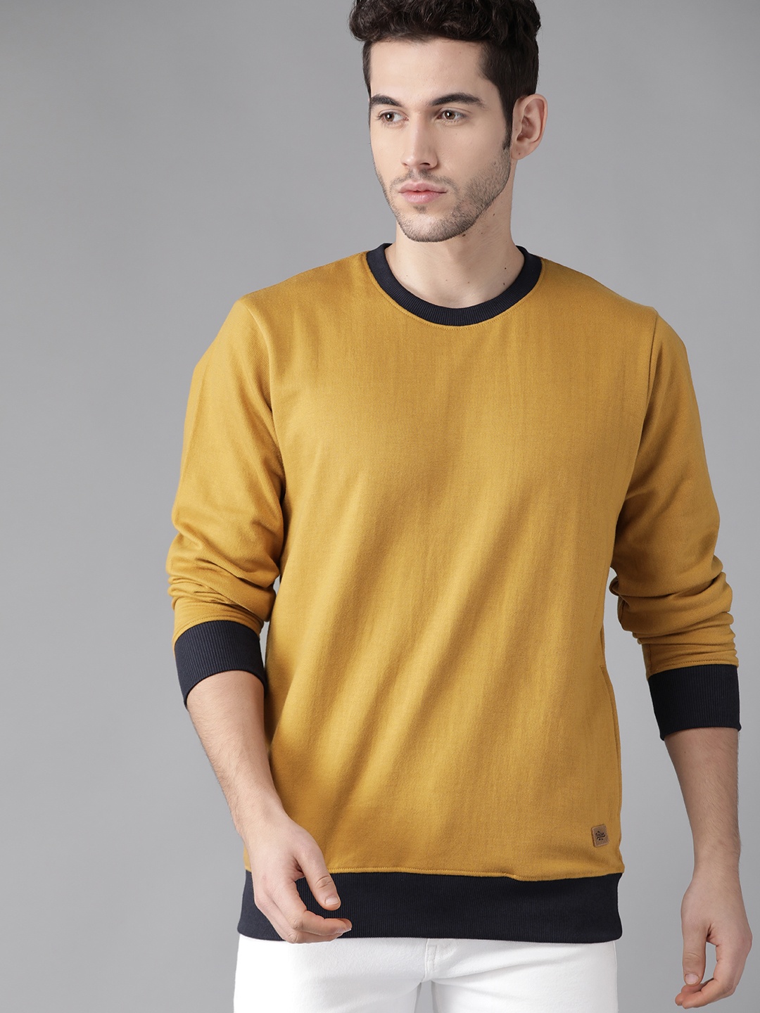 

Roadster Men Mustard Brown Solid Sweatshirt