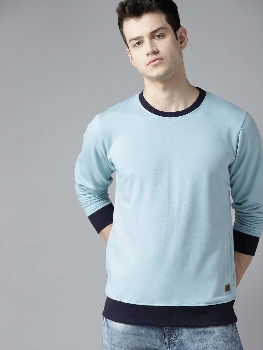 

Roadster Men Blue Solid Sweatshirt
