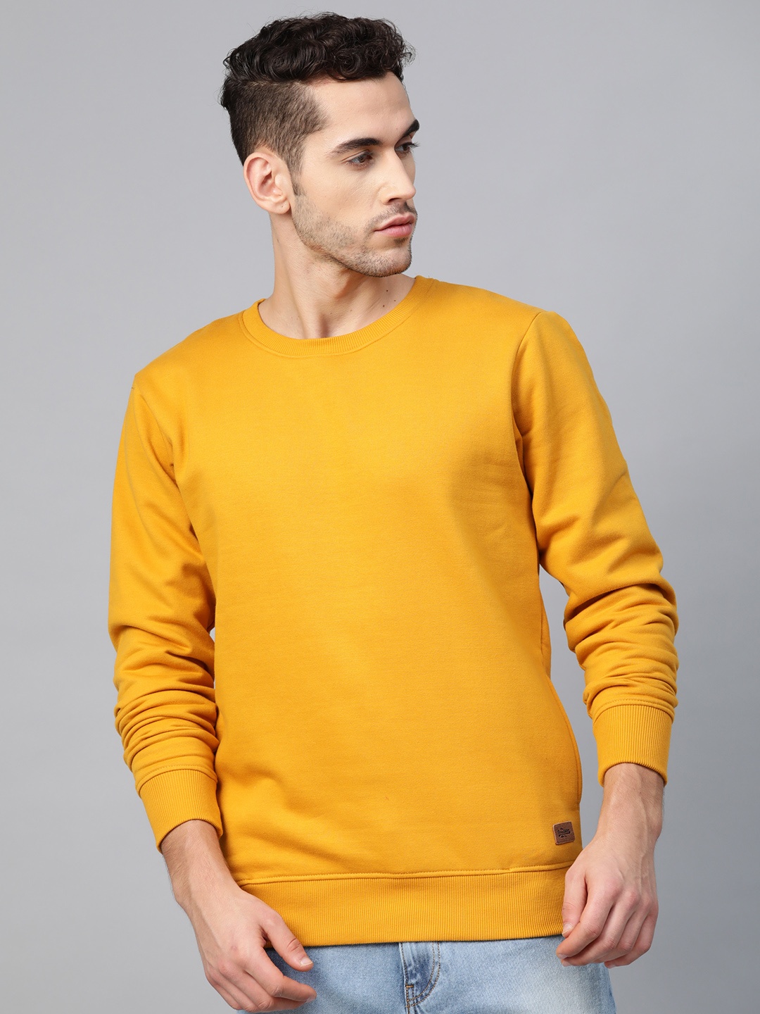 

Roadster Men Mustard Solid Sweatshirt