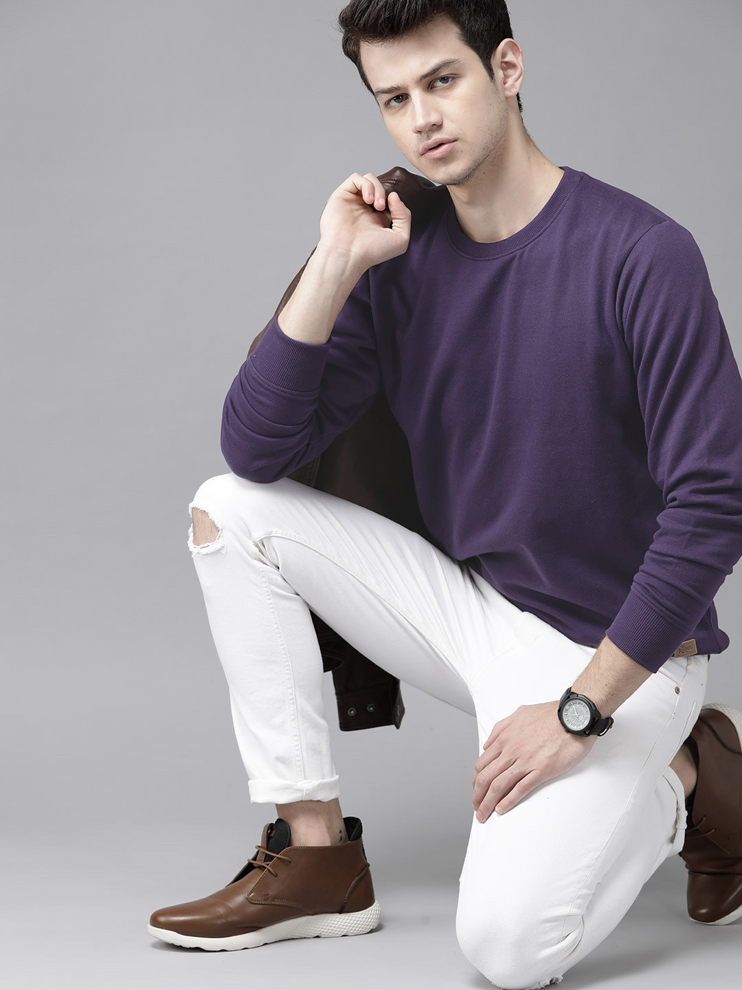 

Roadster Men Purple Solid Sweatshirt