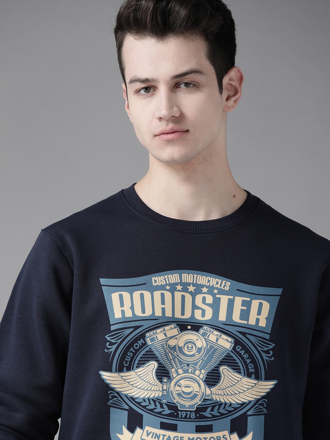 

Roadster Men Navy Blue & Beige Vintage Print Sweatshirt