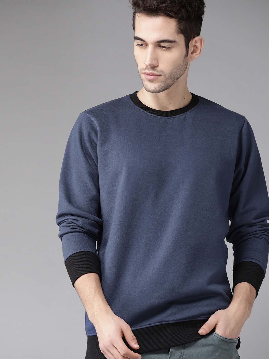 

Roadster Men Blue Solid Sweatshirt