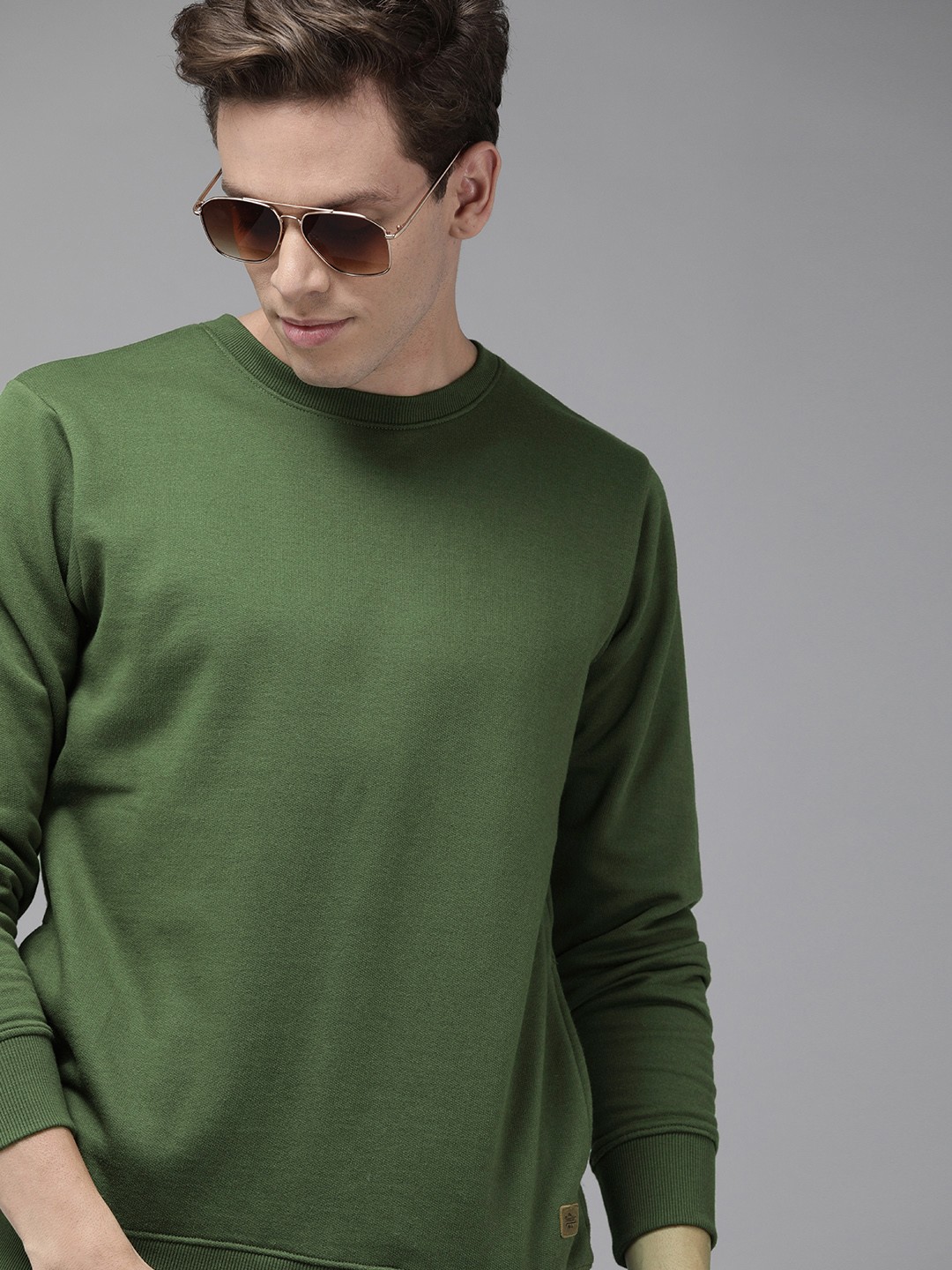 

Roadster Men Olive Green Solid Sweatshirt