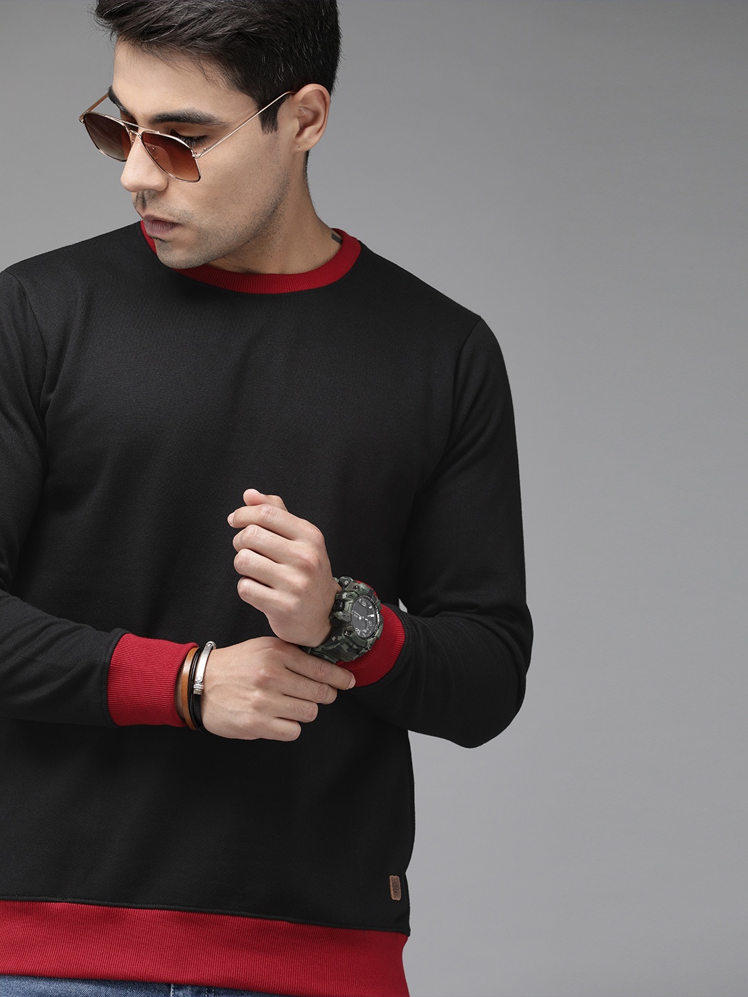 

Roadster Men Black Solid Sweatshirt