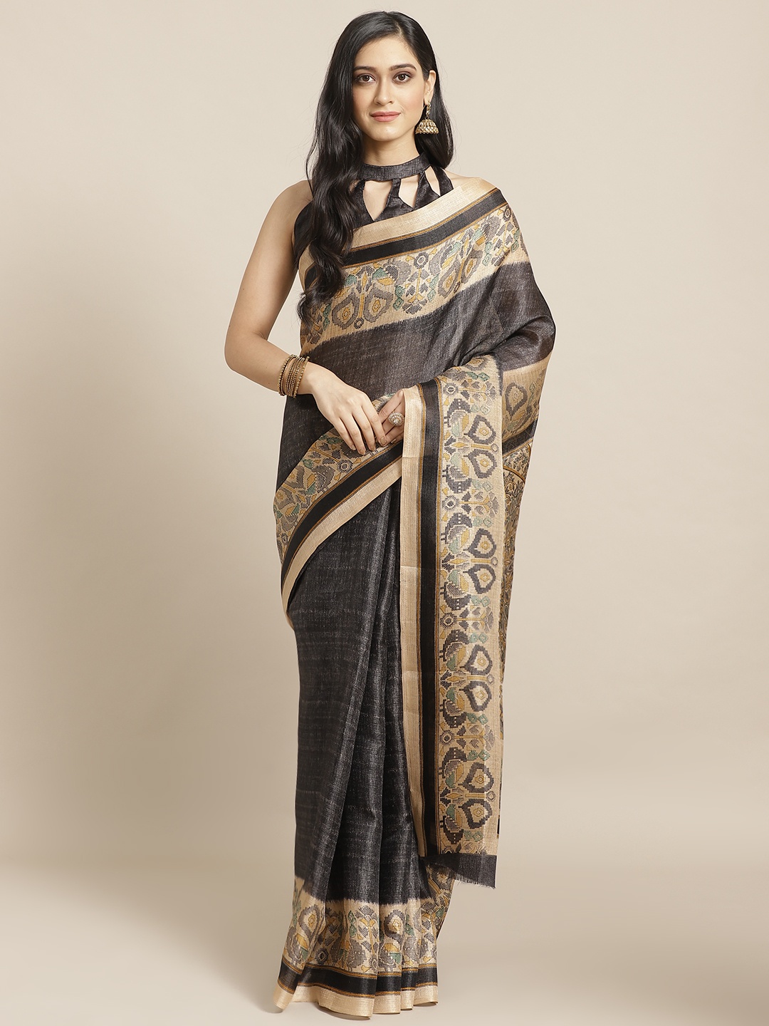 

Saree mall Black & Beige Solid Saree