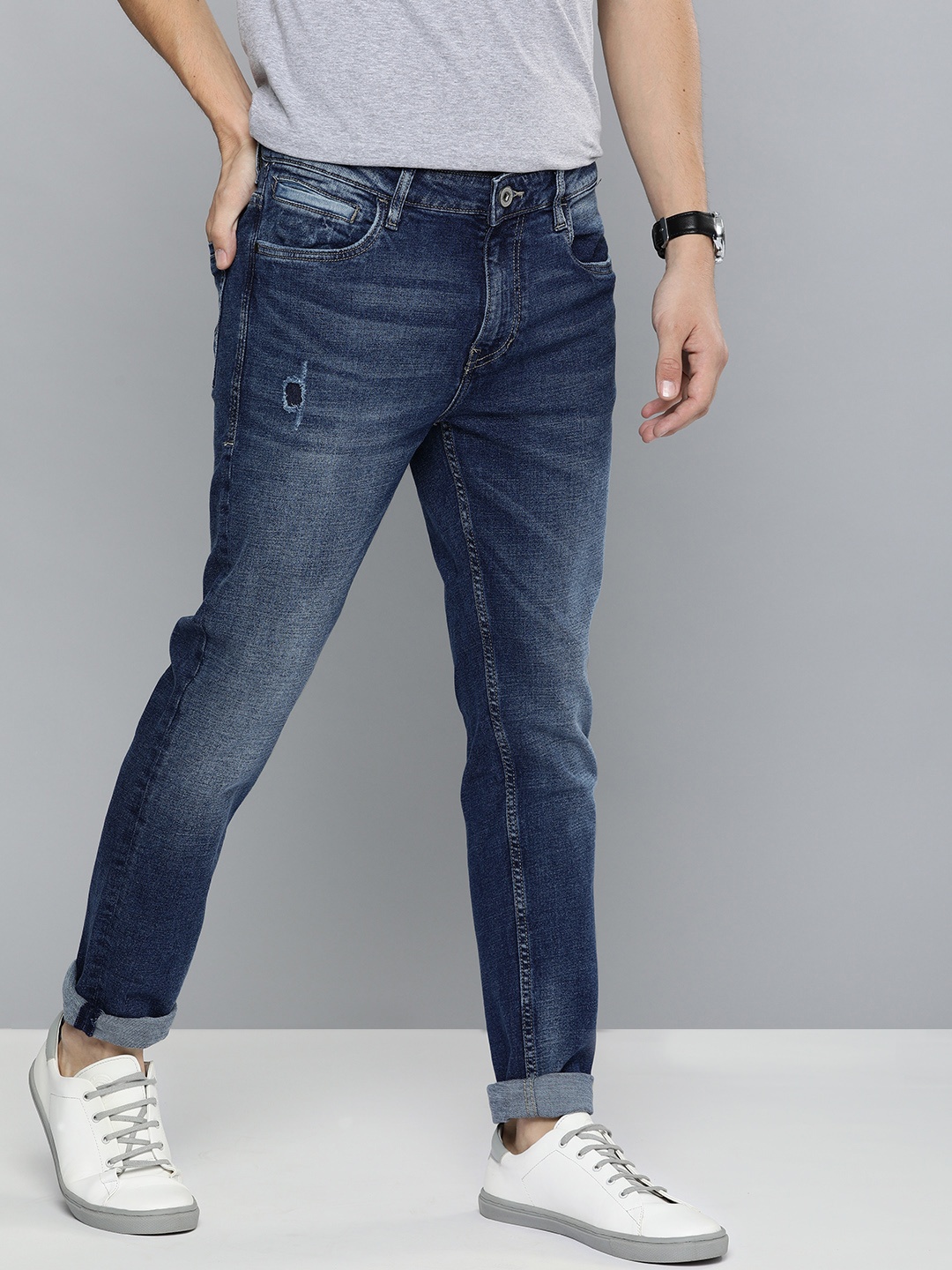

Mast & Harbour Men Navy Blue Slim Tapered Fit Mid-Rise Low Distress Stretchable Jeans