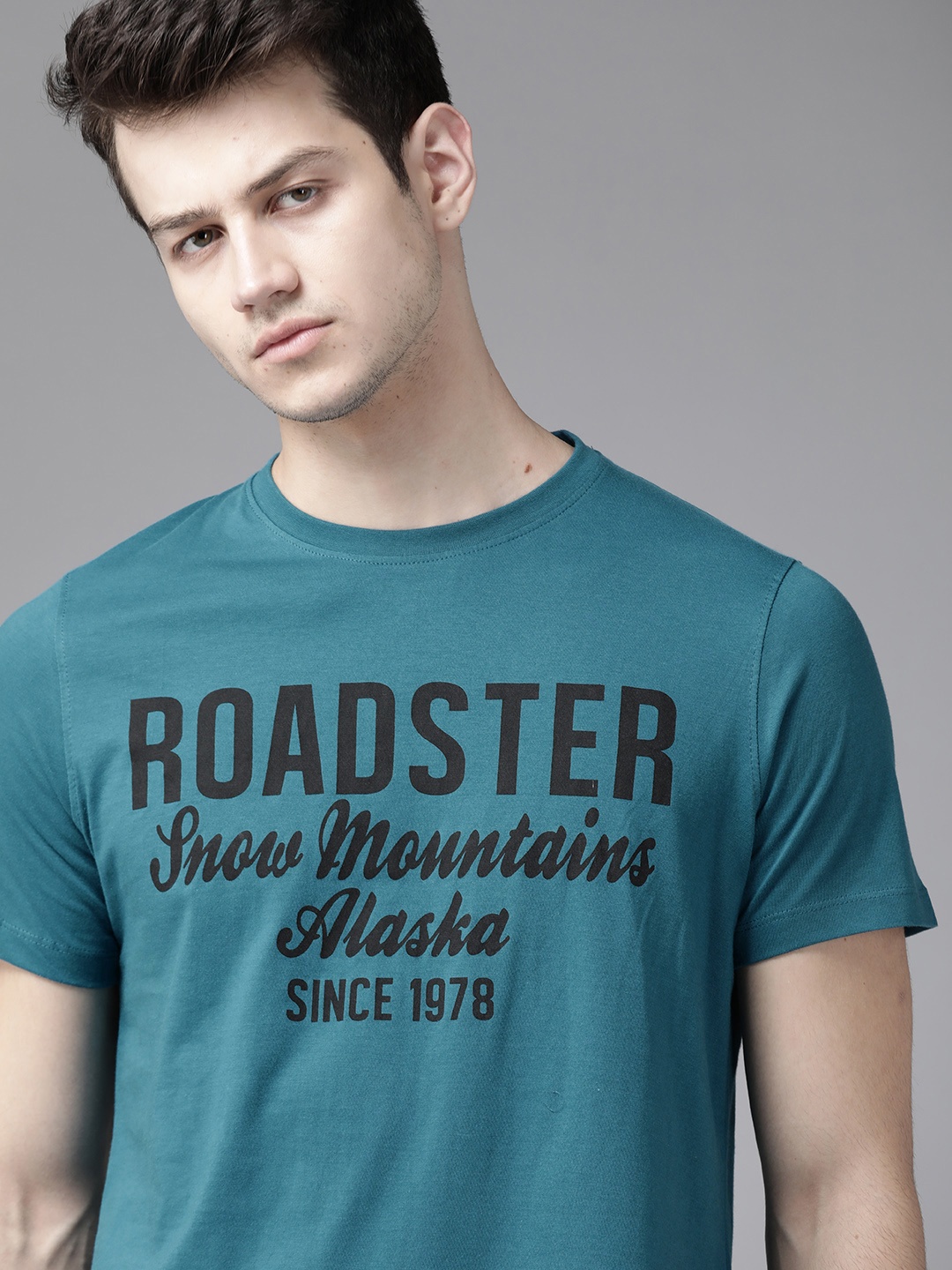 

Roadster Men Teal Blue & Black Printed Round Neck T-shirt