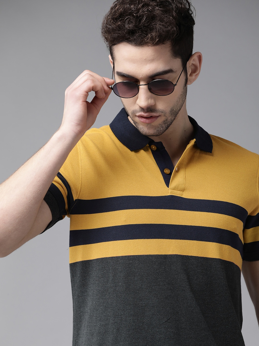 

Roadster Men Mustard Yellow & Charcoal Grey Striped Polo Collar T-shirt